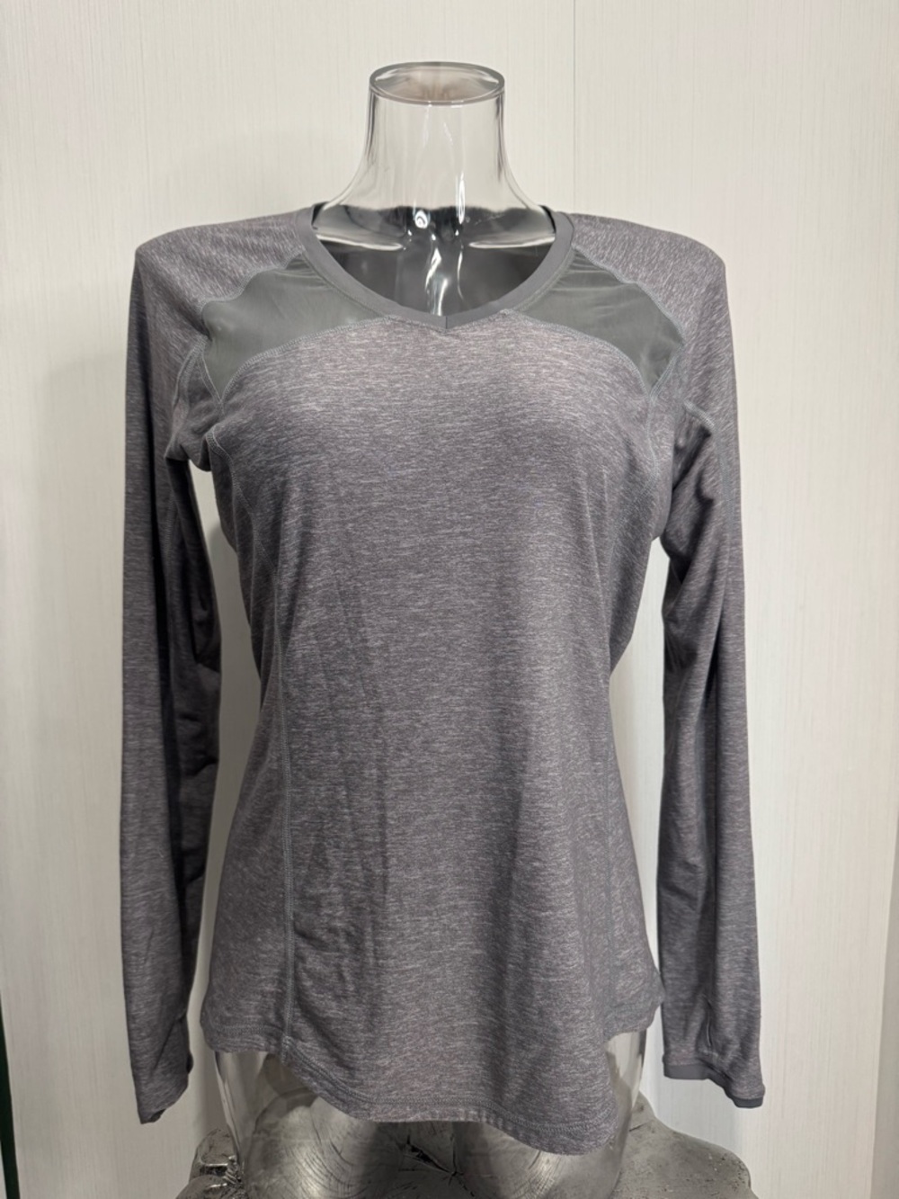 Lululemon Long Sleeve Top. Grey. Size 10. Thumb Holes. No flaws noted.